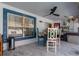 Outdoor patio with seating area, hot tub, and ceiling fan at 14308 Tugwell Ave, Port Charlotte, FL 33953