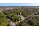 Aerial view of the house, highlighting its position on the lot at 14308 Tugwell Ave, Port Charlotte, FL 33953