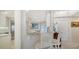 Kitchen features a breakfast bar with seating for two and modern appliances at 1713 Starling Dr # 1713, Sarasota, FL 34231
