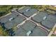 Aerial view of eight well-maintained tennis courts at 1713 Starling Dr # 1713, Sarasota, FL 34231