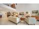 Spacious living room with high ceilings, comfortable seating and access to balcony at 1713 Starling Dr # 1713, Sarasota, FL 34231