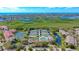 Community overview showcasing location, amenities, and water views at 1713 Starling Dr # 1713, Sarasota, FL 34231