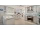 Modern kitchen featuring stainless steel appliances and white cabinets at 1713 Starling Dr # 1713, Sarasota, FL 34231