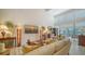 Relaxing living room features comfortable seating, a large TV, and access to balcony at 1713 Starling Dr # 1713, Sarasota, FL 34231