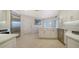 Modern kitchen with white cabinets, stainless steel appliances, and ample counter space at 1713 Starling Dr # 1713, Sarasota, FL 34231