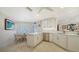 Updated kitchen with stainless steel appliances and white cabinetry at 1713 Starling Dr # 1713, Sarasota, FL 34231