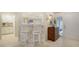 Kitchen features a breakfast bar and white cabinetry at 1713 Starling Dr # 1713, Sarasota, FL 34231