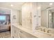 Elegant bathroom with double vanity and ample storage at 9393 Midnight Pass Rd # 503, Sarasota, FL 34242