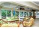 Relaxing common area with wicker furniture and view at 9393 Midnight Pass Rd # 503, Sarasota, FL 34242