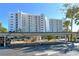 Covered parking garage with assigned parking space at 9393 Midnight Pass Rd # 503, Sarasota, FL 34242