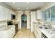 Kitchen with granite counters and stainless steel appliances at 9393 Midnight Pass Rd # 503, Sarasota, FL 34242