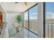Serene water view from living room windows, creating a tranquil ambiance at 9393 Midnight Pass Rd # 503, Sarasota, FL 34242