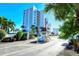 Gated community entrance with security booth at 9393 Midnight Pass Rd # 503, Sarasota, FL 34242