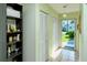 Light and airy entryway with built-in shelving and view of the backyard at 6041 Lilli Way # 72, Bradenton, FL 34207