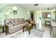 Open living and dining area with light walls and tile floor at 6041 Lilli Way # 72, Bradenton, FL 34207