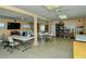 Community room with tables, chairs, and bookcases at 6041 Lilli Way # 72, Bradenton, FL 34207