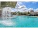Inviting resort-style pool and waterfall, adjacent to clubhouse at 17825 Gawthrop Dr # 103, Bradenton, FL 34211