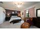 Luxurious main bedroom with king bed and ensuite bath at 17825 Gawthrop Dr # 103, Bradenton, FL 34211