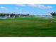 Irrigation system watering the lush green at 17825 Gawthrop Dr # 103, Bradenton, FL 34211