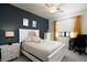 Bright bedroom featuring a comfy bed and work area at 17825 Gawthrop Dr # 103, Bradenton, FL 34211