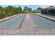 Two bocce ball courts with brick edging at 17825 Gawthrop Dr # 103, Bradenton, FL 34211