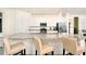 Island kitchen with granite countertops and bar seating at 17825 Gawthrop Dr # 103, Bradenton, FL 34211