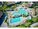 Large resort-style pool with plenty of lounge chairs at 17825 Gawthrop Dr # 103, Bradenton, FL 34211