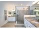 Spa-like bathroom with double vanity and large shower at 17825 Gawthrop Dr # 103, Bradenton, FL 34211