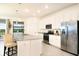 Modern kitchen with granite countertops and stainless steel appliances at 17825 Gawthrop Dr # 103, Bradenton, FL 34211