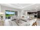 Bright living room with modern furniture and view at 27059 Curitiba Dr, Punta Gorda, FL 33983