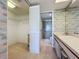 Walk-in closet and bathroom with shower and vanity at 4382 Madeira Ct # 3361, Sarasota, FL 34233
