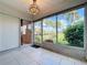 Spacious screened porch overlooking a lush green landscape at 4382 Madeira Ct # 3361, Sarasota, FL 34233