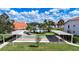 Shuffleboard courts nestled in a green lawn area at 4382 Madeira Ct # 3361, Sarasota, FL 34233