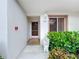 Exterior of unit with private entrance and bench at 4382 Madeira Ct # 3361, Sarasota, FL 34233