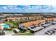 Aerial view of community with pool, tennis courts, and parking at 4382 Madeira Ct # 3361, Sarasota, FL 34233
