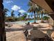 View of the pool and patio area with seating at 8191 Varenna Dr, Sarasota, FL 34231