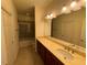 Bathroom with single vanity and bathtub shower combo at 8191 Varenna Dr, Sarasota, FL 34231