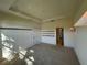 Bedroom with large windows, and built-in shelves at 8191 Varenna Dr, Sarasota, FL 34231