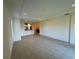 Spacious living room with tile floors and kitchen views at 8191 Varenna Dr, Sarasota, FL 34231