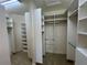 Large walk-in closet with ample shelving and hanging space at 8191 Varenna Dr, Sarasota, FL 34231