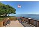 Relaxing waterfront deck with scenic views at 1801 Gulf N Dr # 204, Bradenton Beach, FL 34217