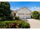 Two-car garage and well-maintained landscaping at 7232 Presidio Gln, Lakewood Ranch, FL 34202