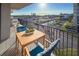 Relax on the balcony with seating and enjoy the scenic view of the beach and waterway at 1055 Beach Rd # B-302, Sarasota, FL 34242