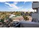 View of the community tennis courts from an elevated deck at 1055 Beach Rd # B-302, Sarasota, FL 34242