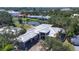 Bird's eye view of residence with an attached garage highlighting nearby waterways and homes at 1802 Field Rd, Sarasota, FL 34231