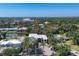 Drone shot of the house showing proximity to city, water and surrounding residential neighborhood at 1802 Field Rd, Sarasota, FL 34231