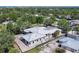 Aerial view of home under construction, showing roof with underlayment and window openings at 1802 Field Rd, Sarasota, FL 34231