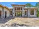 Exterior entrance of home under construction, showing block structure and window and door openings at 1802 Field Rd, Sarasota, FL 34231
