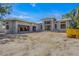 Exterior view of home under construction, showing block structure, windows, and attached garage at 1802 Field Rd, Sarasota, FL 34231