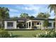 Modern home with pool and covered patio, showcasing a stunning backyard at 1802 Field Rd, Sarasota, FL 34231